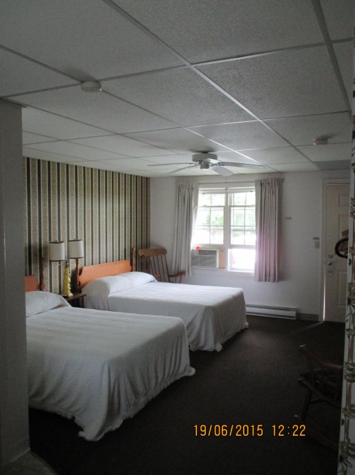 Spacious bedrooms inside the Long Beach Motor Inn